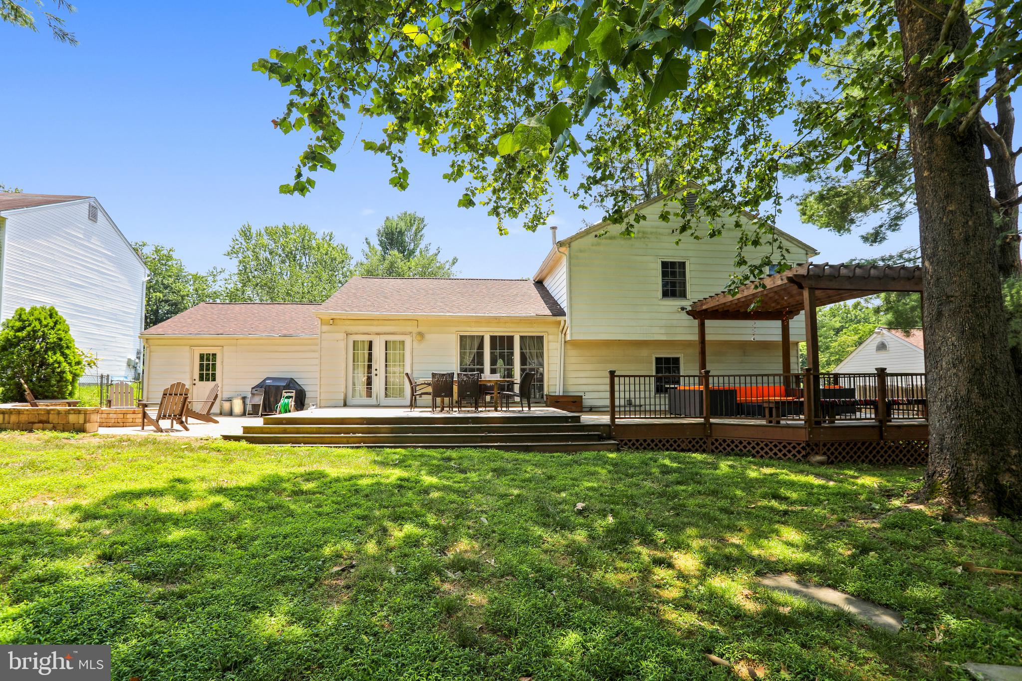 10145 Colebrook Avenue Potomac, MD 20854 - Photo 29 of 30 a front view of a house with garden