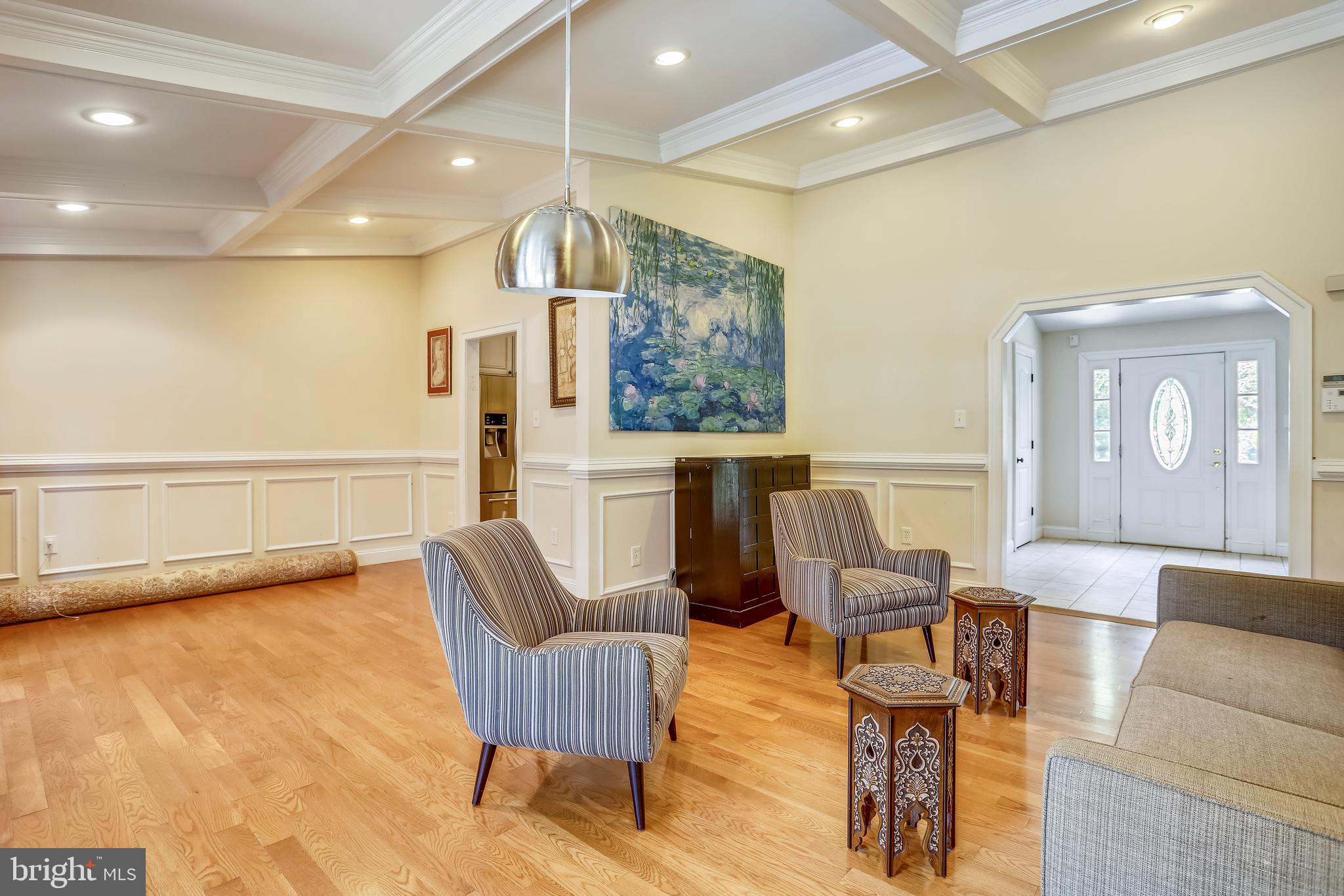 10145 Colebrook Avenue Potomac, MD 20854 - Photo 6 of 30 a living room with furniture and a large window