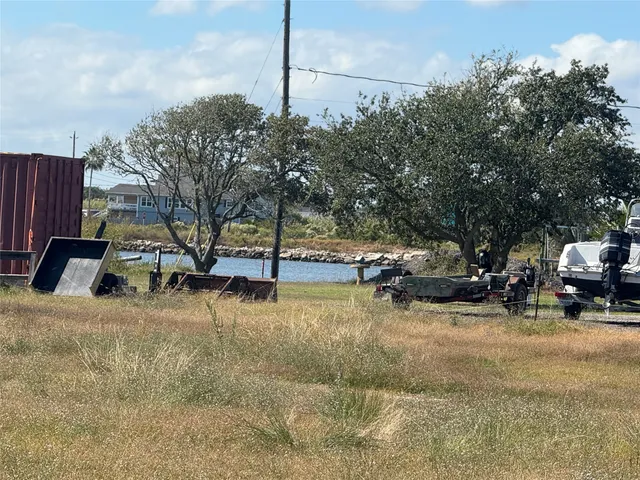 a view of a street with cars