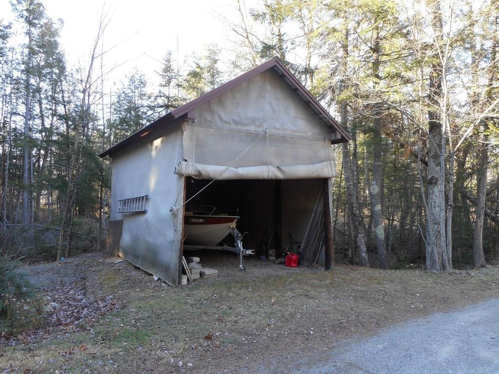 497 Main Road Milford, ME 04461 - Photo 26 of 35 Pole barn large enough to store a boat.