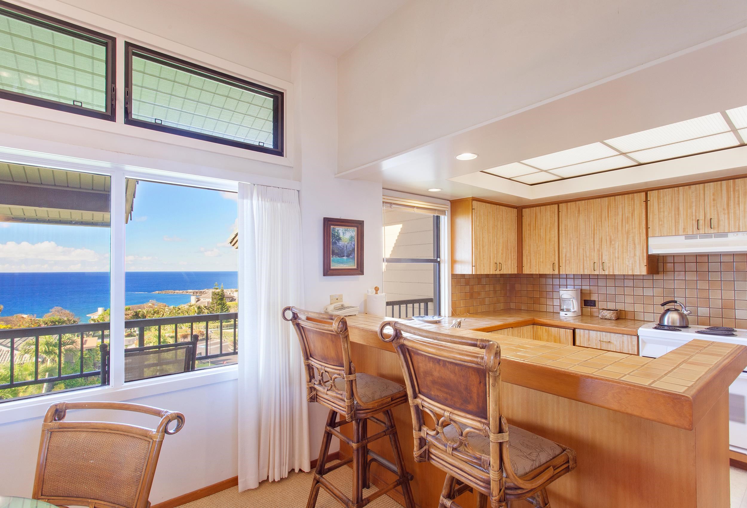 100 Ridge Road, Unit 321 Lahaina, HI 96761 - Photo 11 of 30 a kitchen that has a cabinets counter space and a window