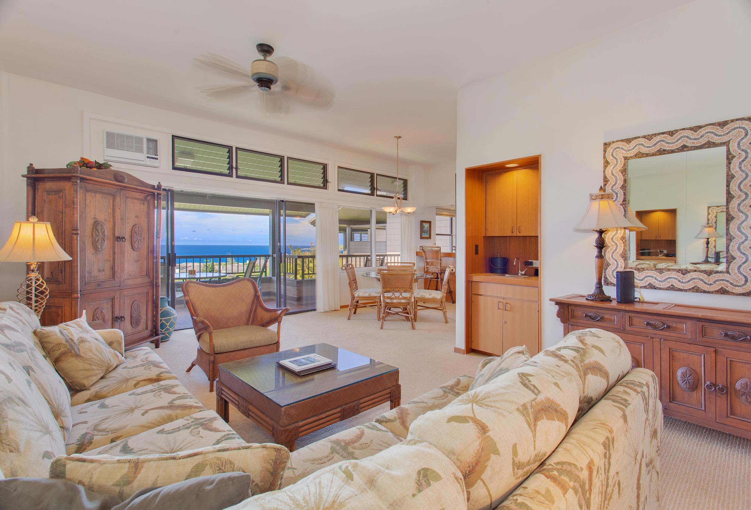100 Ridge Road, Unit 321 Lahaina, HI 96761 - Photo 26 of 30 a living room with furniture and a large window