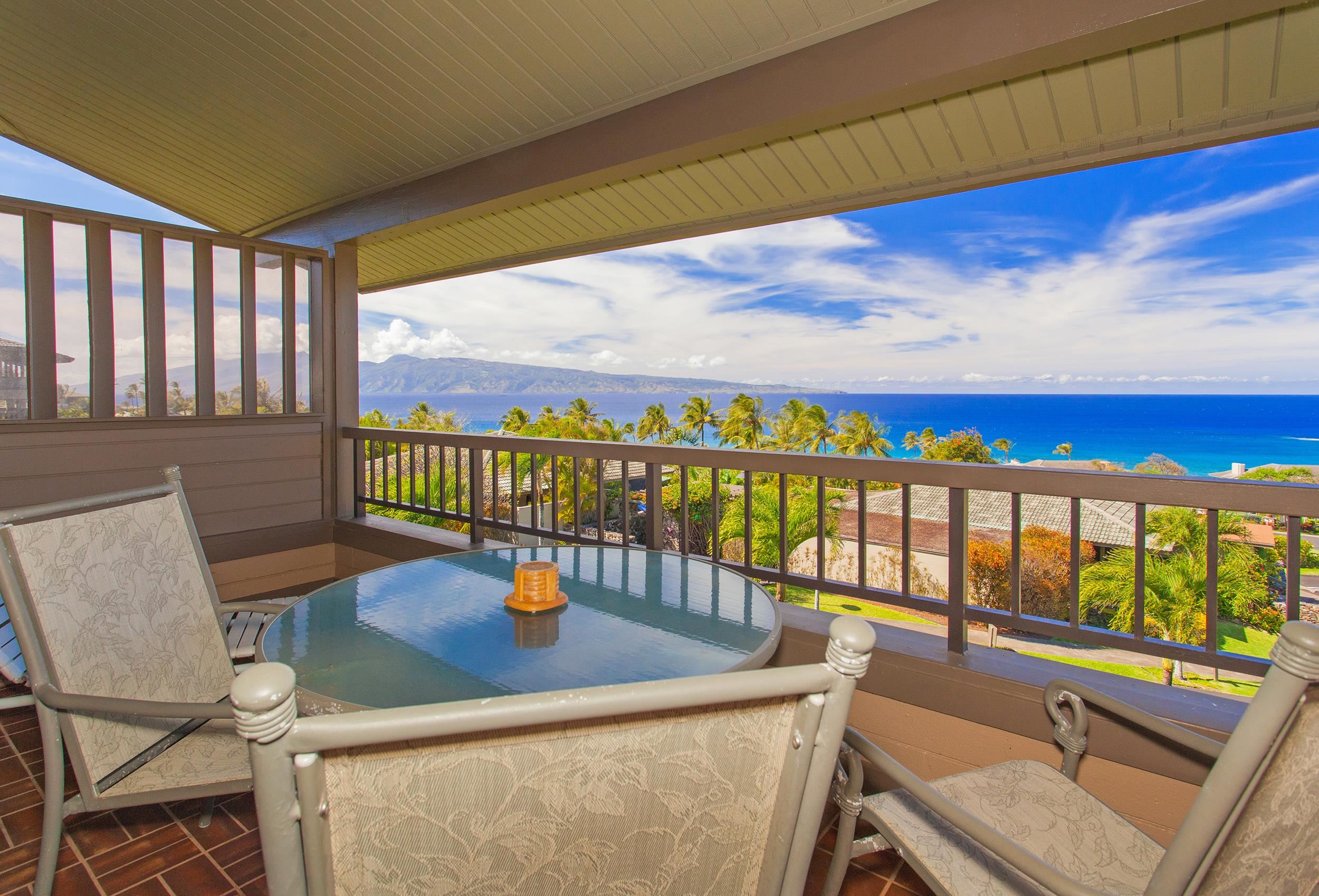 100 Ridge Road, Unit 321 Lahaina, HI 96761 - Photo 6 of 30 a view of a chairs and table in the balcony