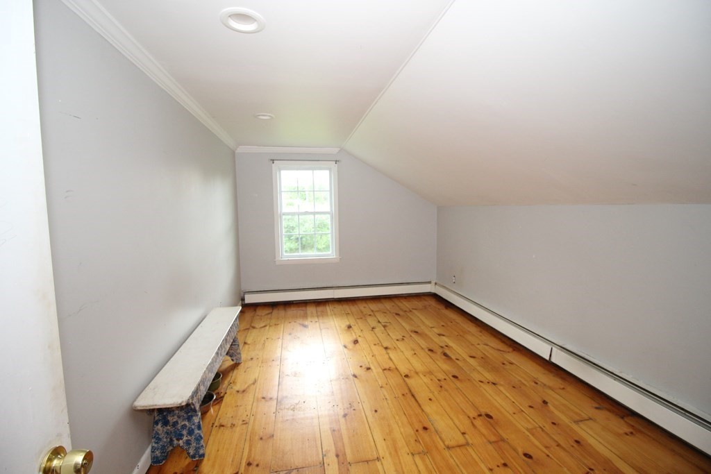 91 Davis Road Westminster, MA 01473 - Photo 23 of 37 a view of a room with wooden floor and window