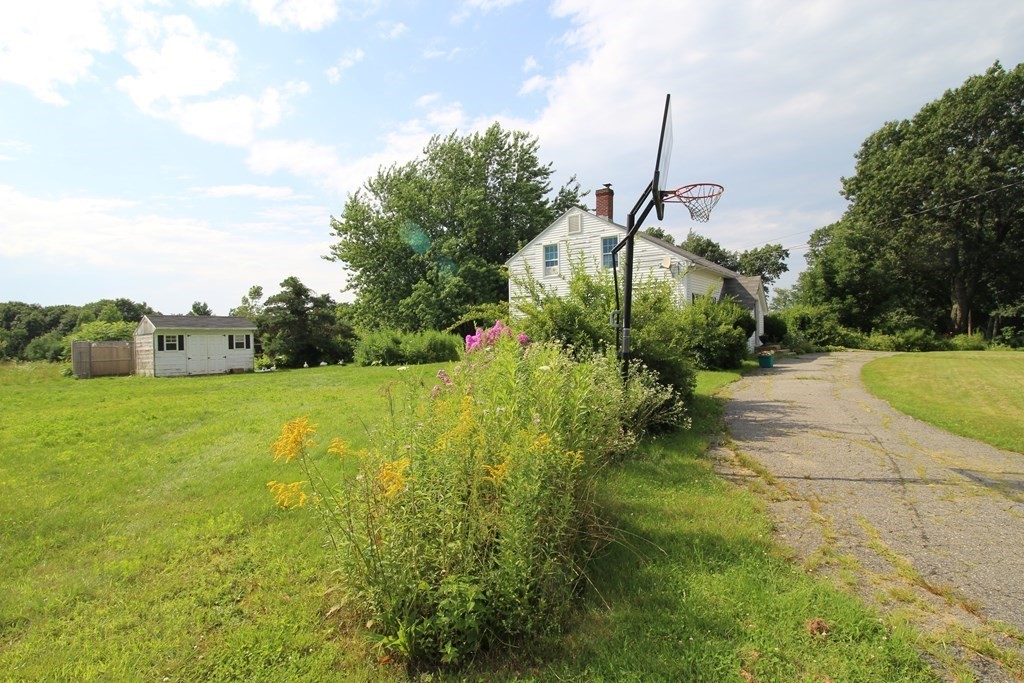91 Davis Road Westminster, MA 01473 - Photo 37 of 37 a view of a garden with plants