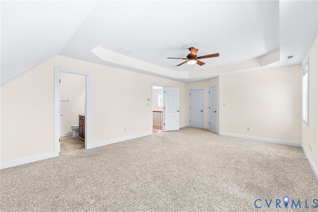 15430 River Road Chesterfield, VA 23838 - Photo 31 of 46 a view of an empty room with a ceiling fan
