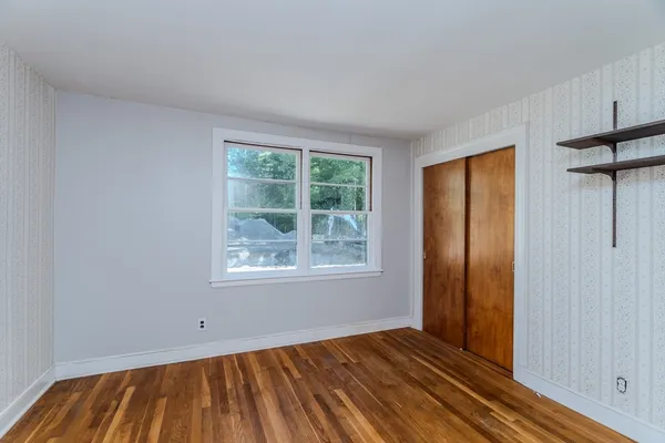 an empty room with windows