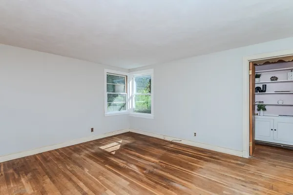wooden floor and window in a room