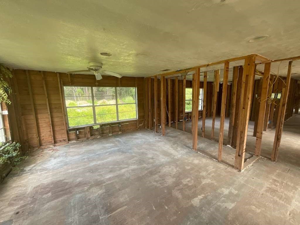 7730 Tram Road Beaumont, TX 77713 - Photo 6 of 9 a view of an empty room with a window