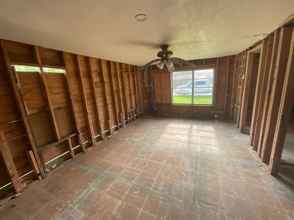 7730 Tram Road Beaumont, TX 77713 - Photo 7 of 9 a view of empty room with windows