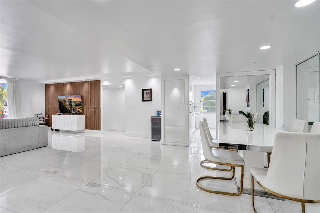 2801 Northeast 183rd Street, Unit 101W Aventura, FL 33160 - Photo 28 of 39 a view of kitchen with furniture and living room