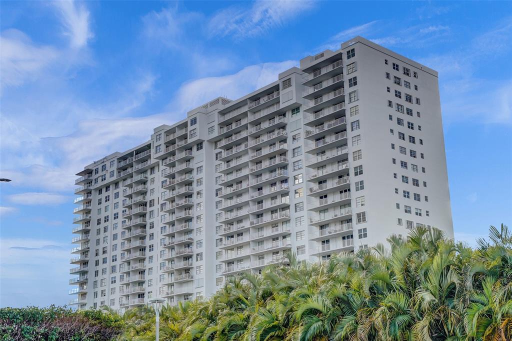 2801 Northeast 183rd Street, Unit 101W Aventura, FL 33160 - Photo 36 of 39 a tall building sitting in the middle of a building