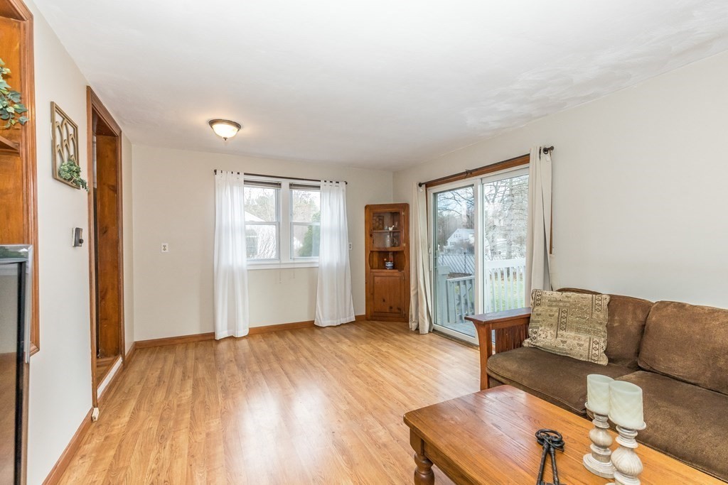 373 Andover Road Billerica, MA 01821 - Photo 13 of 23 a living room with furniture and a window