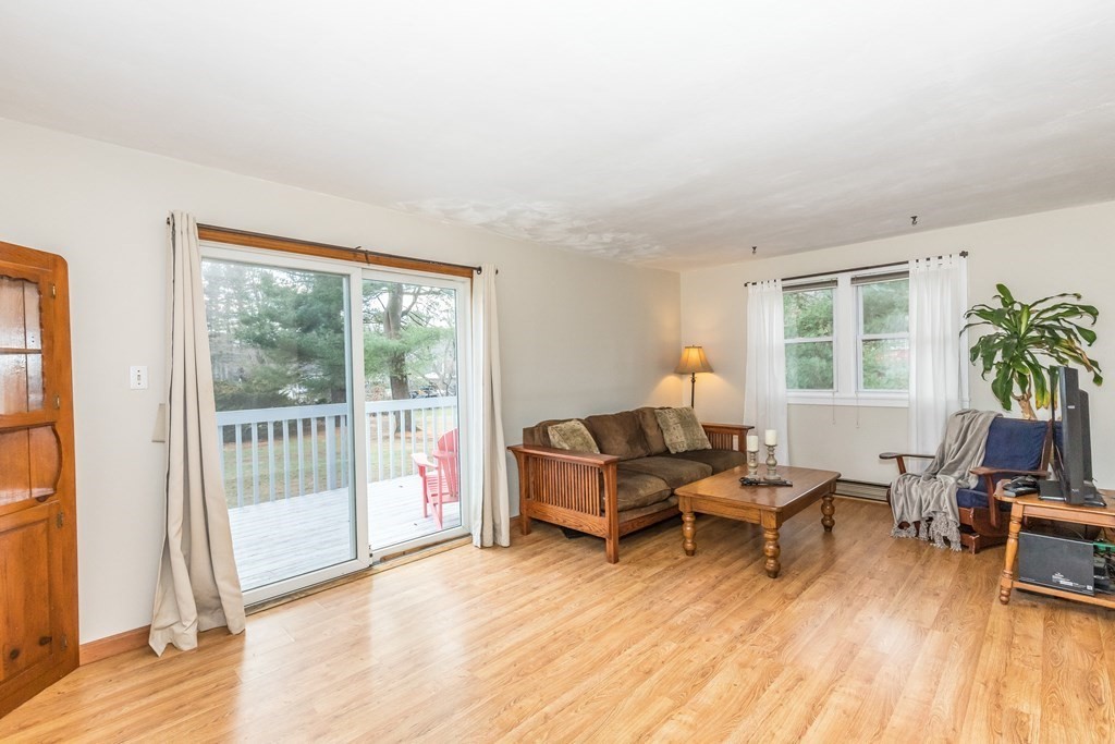 373 Andover Road Billerica, MA 01821 - Photo 15 of 23 a living room with furniture and a large window
