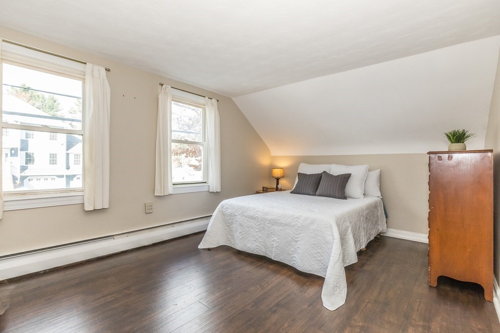 373 Andover Road Billerica, MA 01821 - Photo 18 of 23 a bedroom with a bed and wooden floor