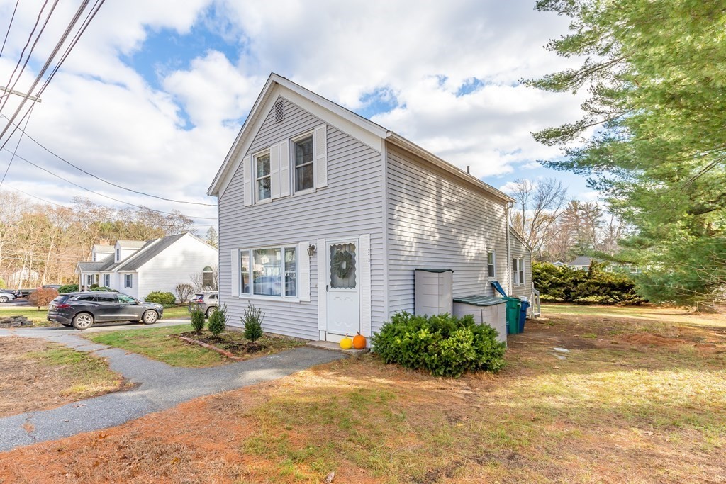 373 Andover Road Billerica, MA 01821 - Photo 2 of 23 a view of a house with a yard