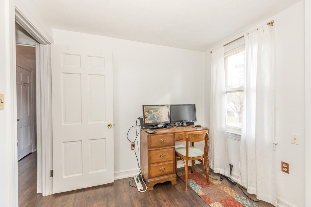 373 Andover Road Billerica, MA 01821 - Photo 21 of 23 a view of a workspace with furniture and a window