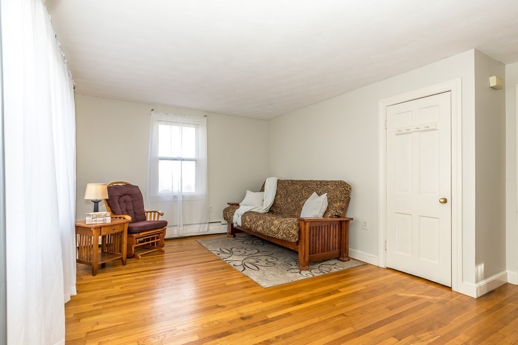 373 Andover Road Billerica, MA 01821 - Photo 3 of 23 a living room with furniture and a window