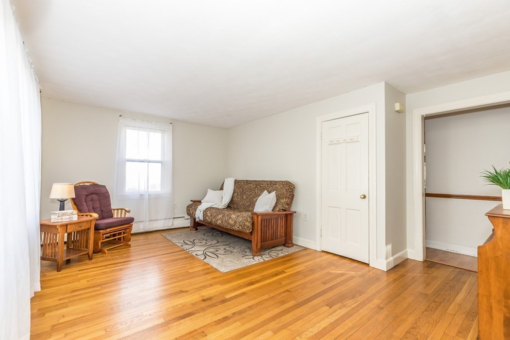 373 Andover Road Billerica, MA 01821 - Photo 4 of 23 a living room with furniture and a window