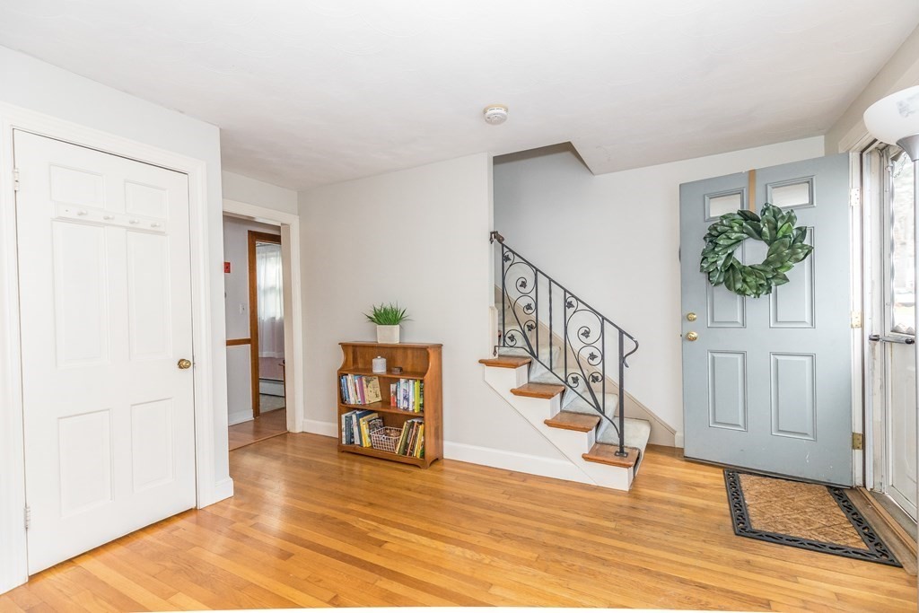 373 Andover Road Billerica, MA 01821 - Photo 5 of 23 a view of entryway with wooden floor and stairs