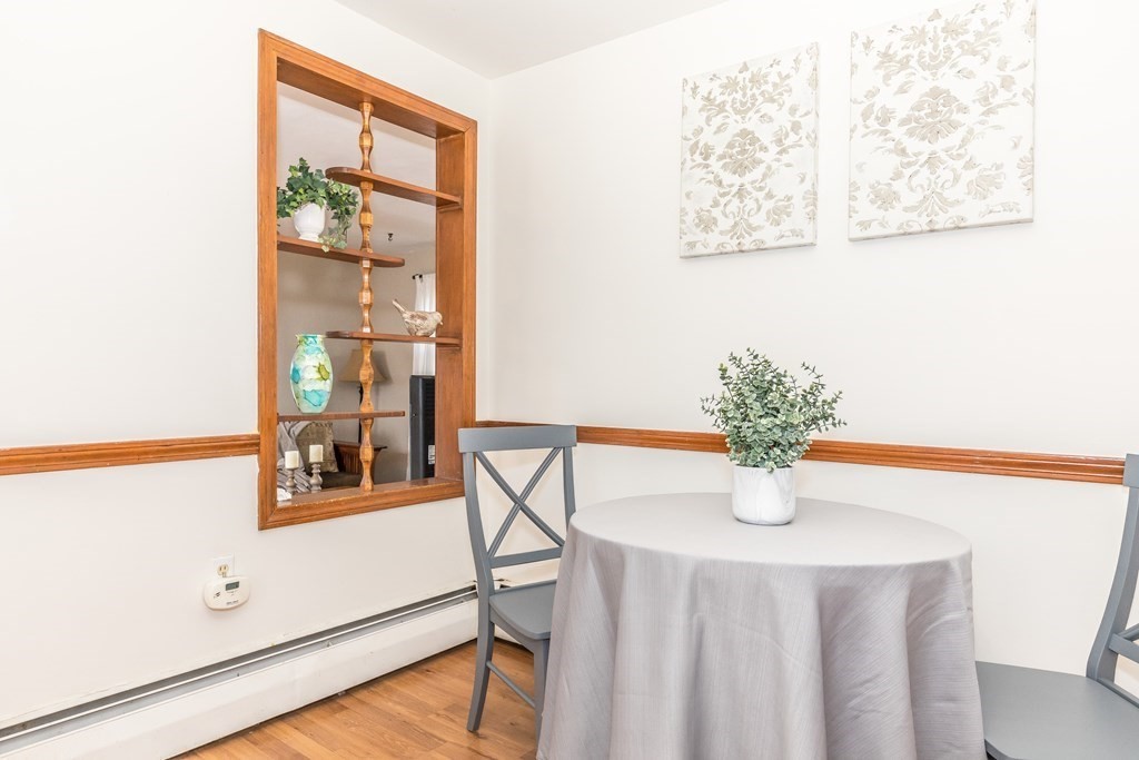 373 Andover Road Billerica, MA 01821 - Photo 8 of 23 a dining room with table & chairs
