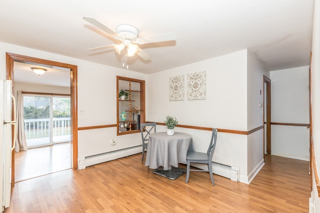373 Andover Road Billerica, MA 01821 - Photo 9 of 23 a view of a room with wooden floor and white walls