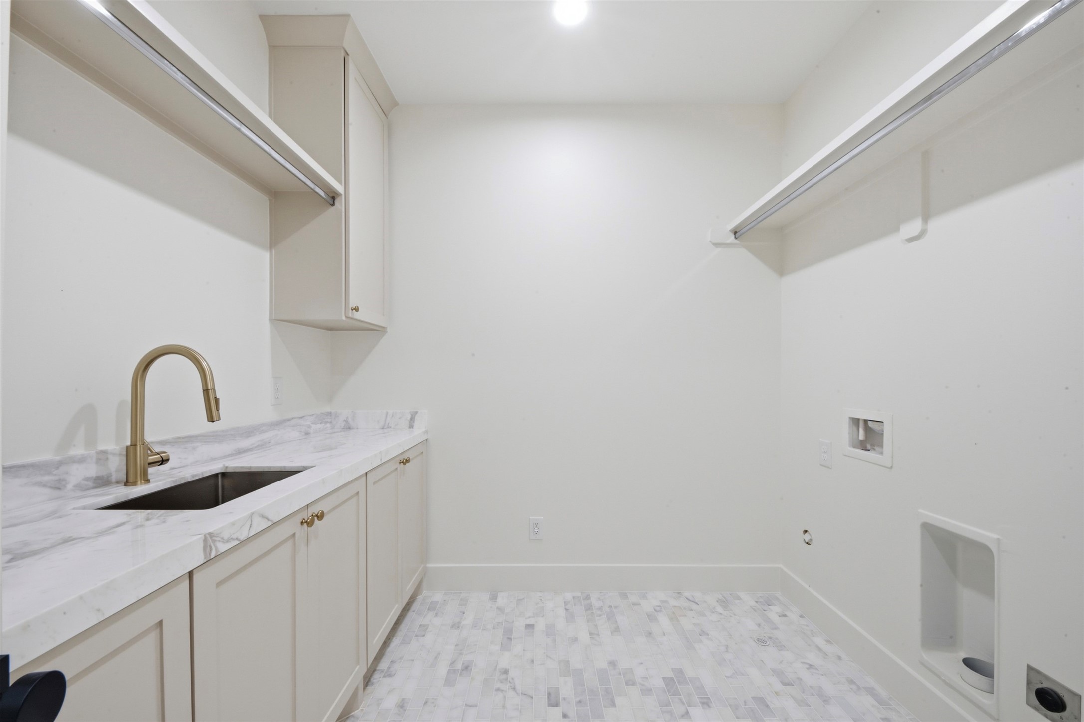 2325 Wroxton Road Houston, TX 77005 - Photo 17 of 31 Spacious Laundry Room with Wash Sink and Drying Racks