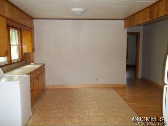 2078 Murray Road Canton, NC 28716 - Photo 11 of 20 a view of storage and utility room with a fireplace