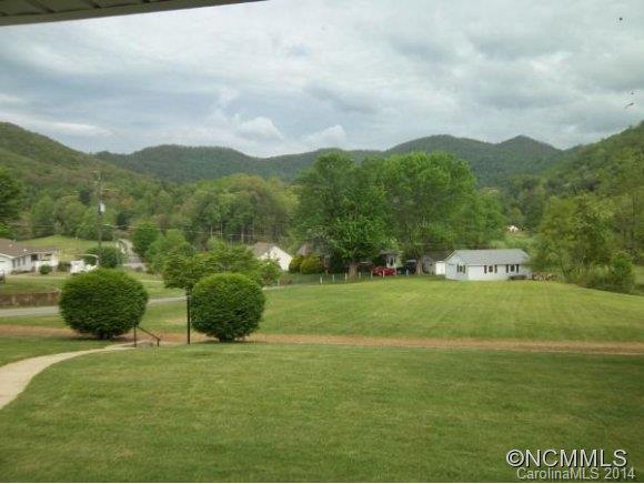 2078 Murray Road Canton, NC 28716 - Photo 17 of 20 a view of grassy field with mountain