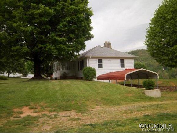 2078 Murray Road Canton, NC 28716 - Photo 5 of 20 a front view of a house with garden
