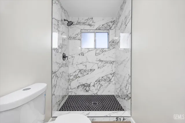 a bathroom with a toilet