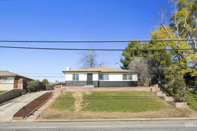 a view of a house with a swimming pool