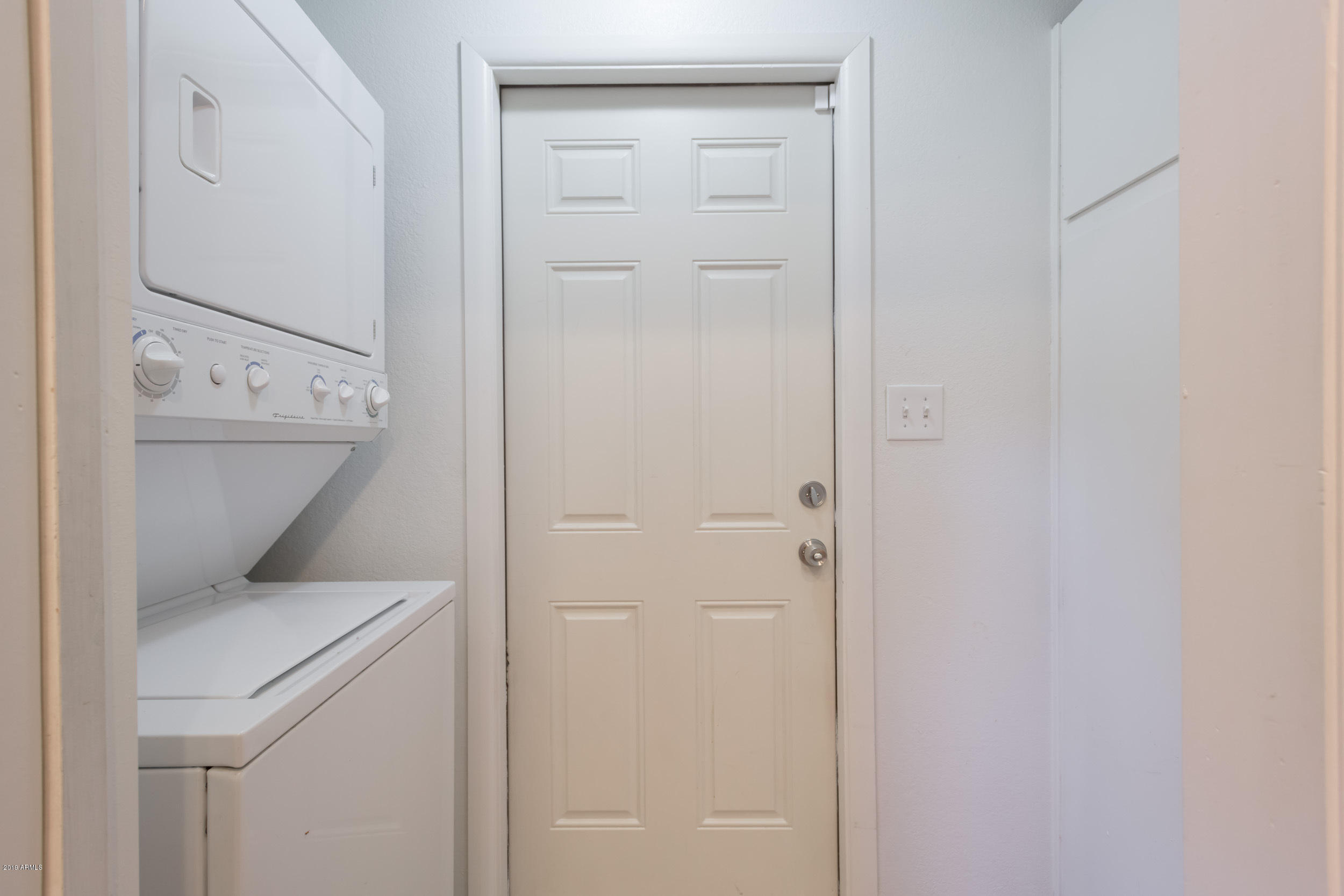 3517 South Terrace Road Tempe, AZ 85282 - Photo 8 of 31 a utility room with dryer and washer