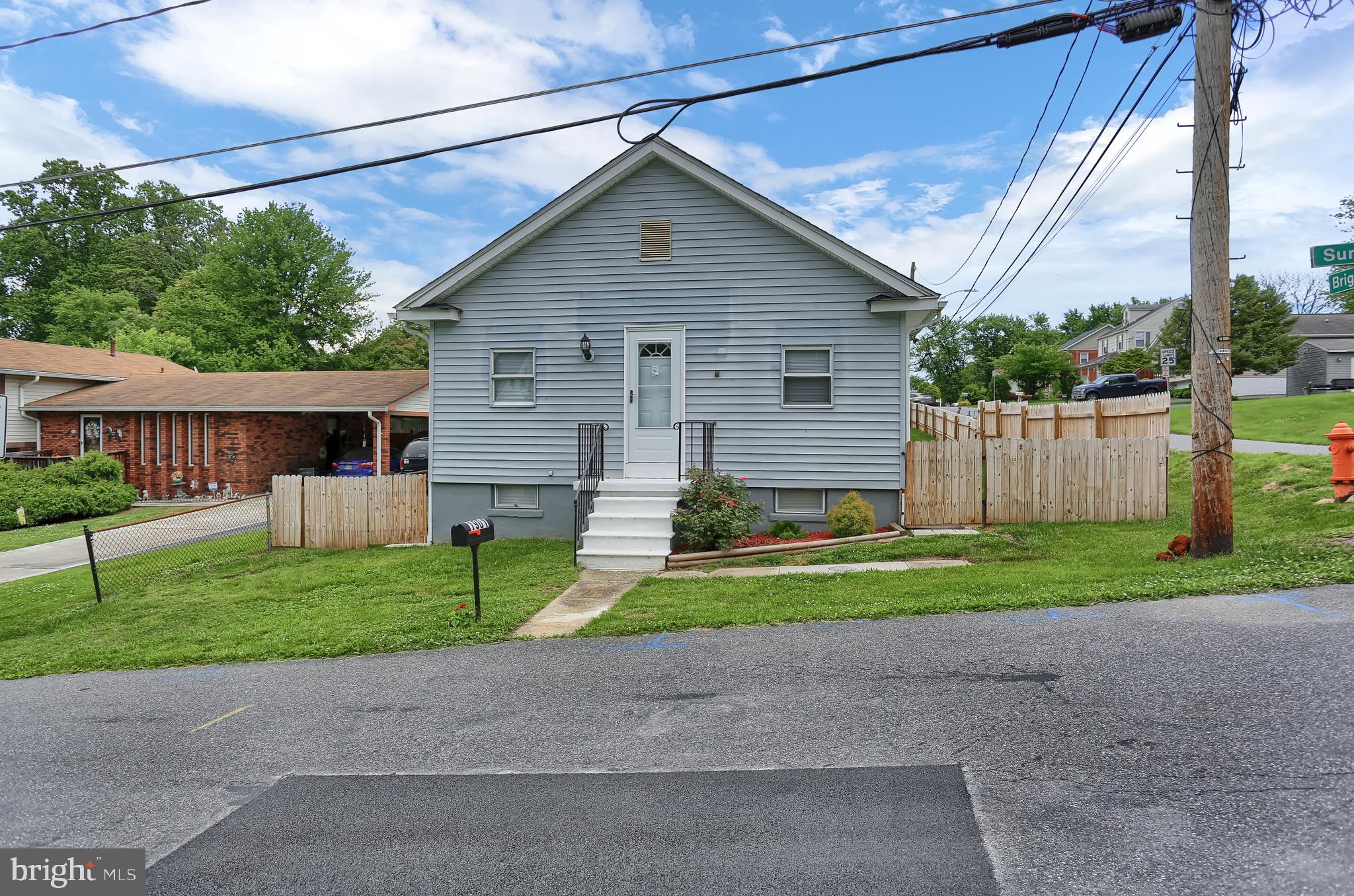 1901 Summit Avenue Rosedale, MD 21237 - Photo 26 of 26 a view of backyard of house and car parked