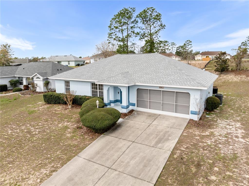 8361 Southwest 135 Loop Ocala, FL 34473 - Photo 1 of 1 a house view with a outdoor space