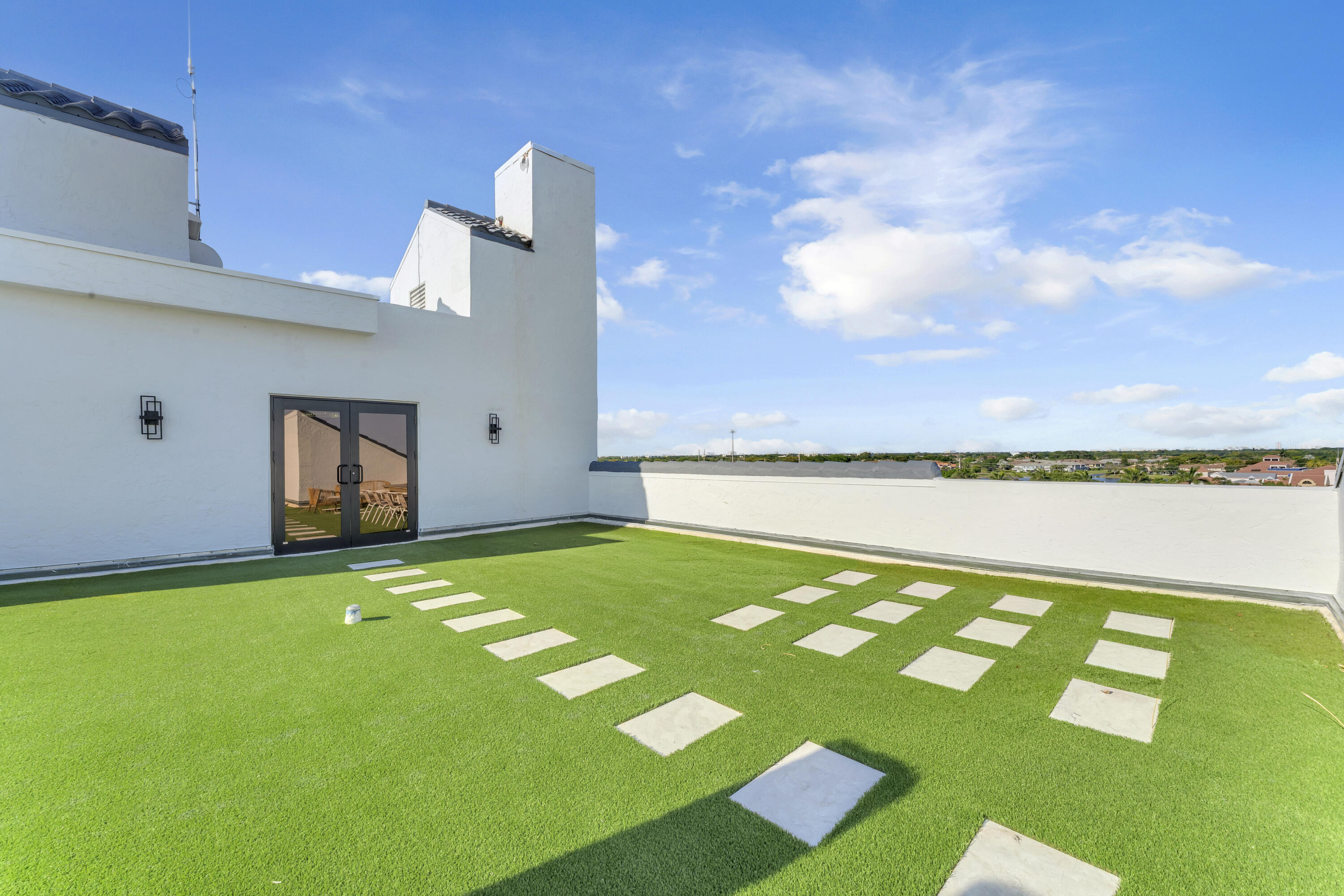 7178 Promenade Drive, Unit 801B Boca Raton, FL 33433 - Photo 36 of 46 turfed patio
