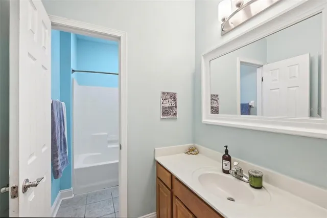 a house view with a sitting space and garden