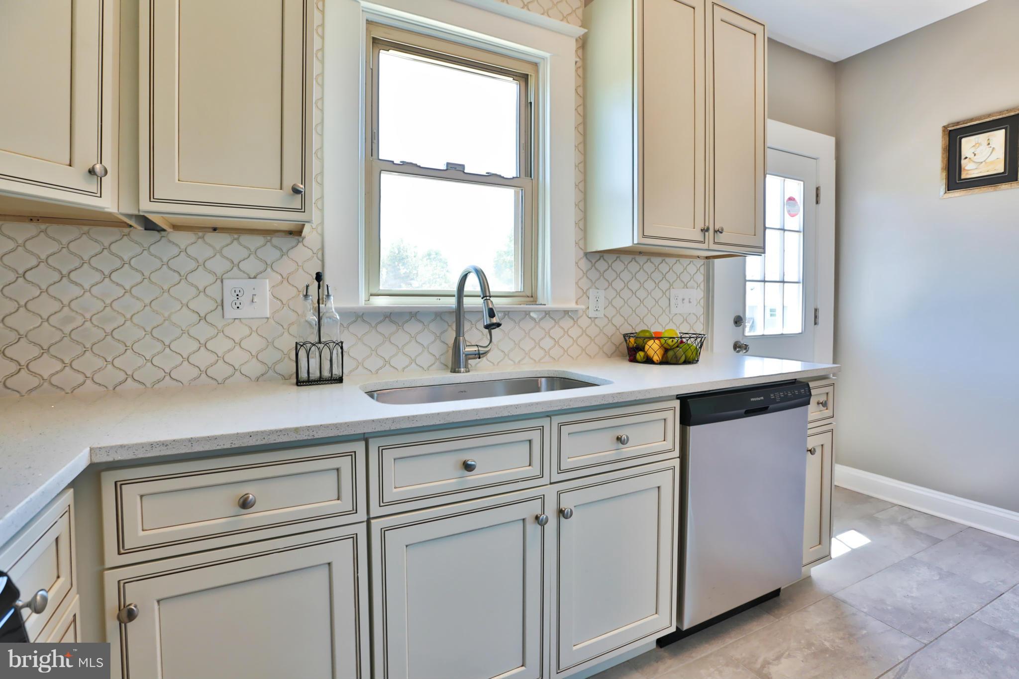 403 Walcott Road Baltimore, MD 21206 - Photo 11 of 29 Beautiful White Cabinets Add Plenty of Storage