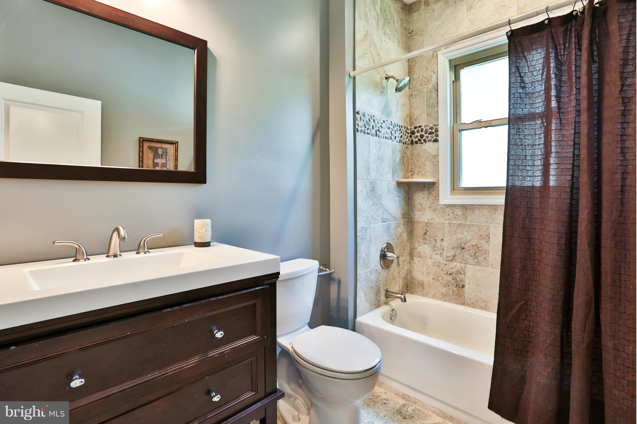 403 Walcott Road Baltimore, MD 21206 - Photo 17 of 29 Custom Tile and Gorgeous Backsplash
