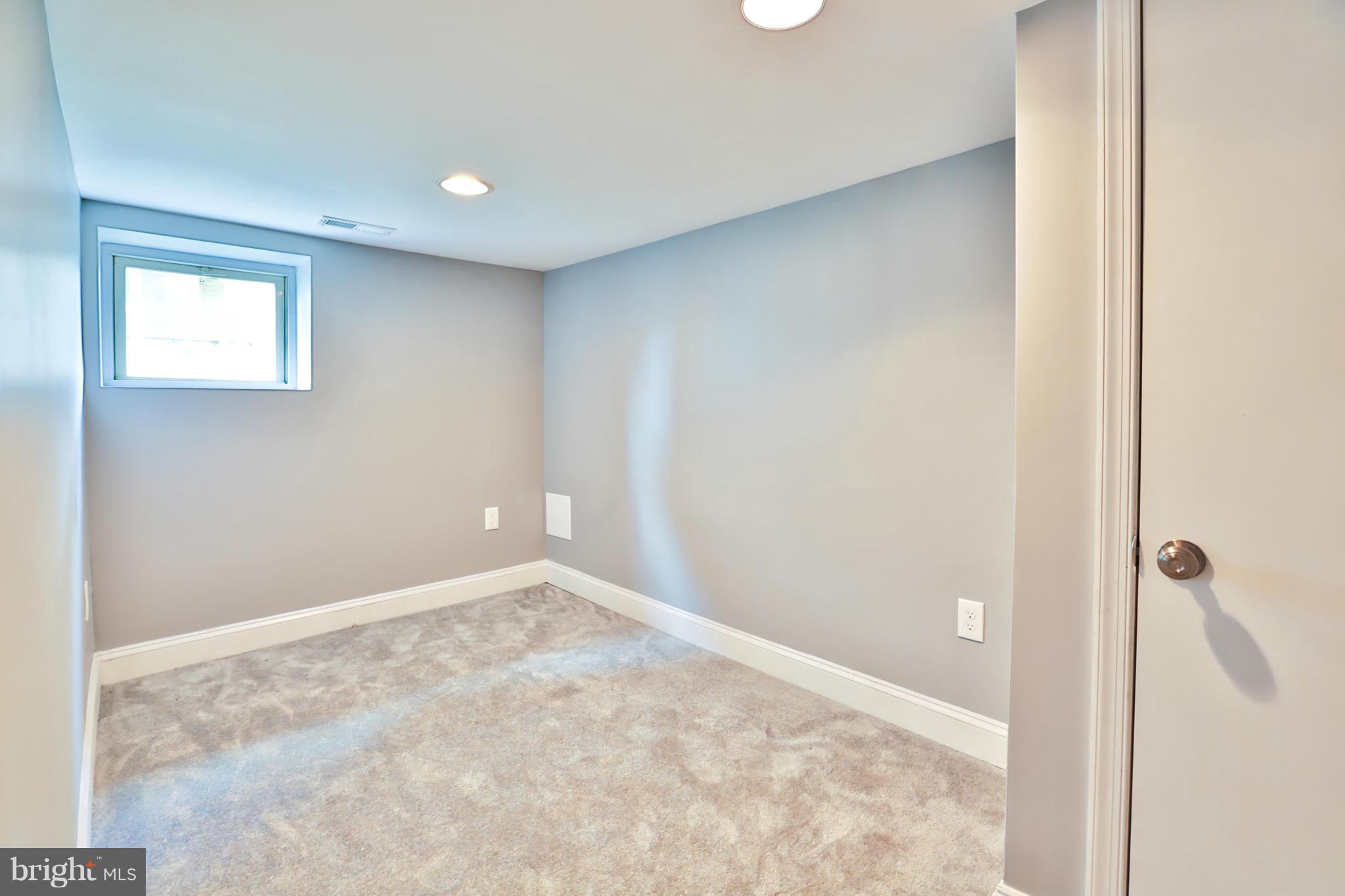 403 Walcott Road Baltimore, MD 21206 - Photo 22 of 29 Private Lower Level Bedroom