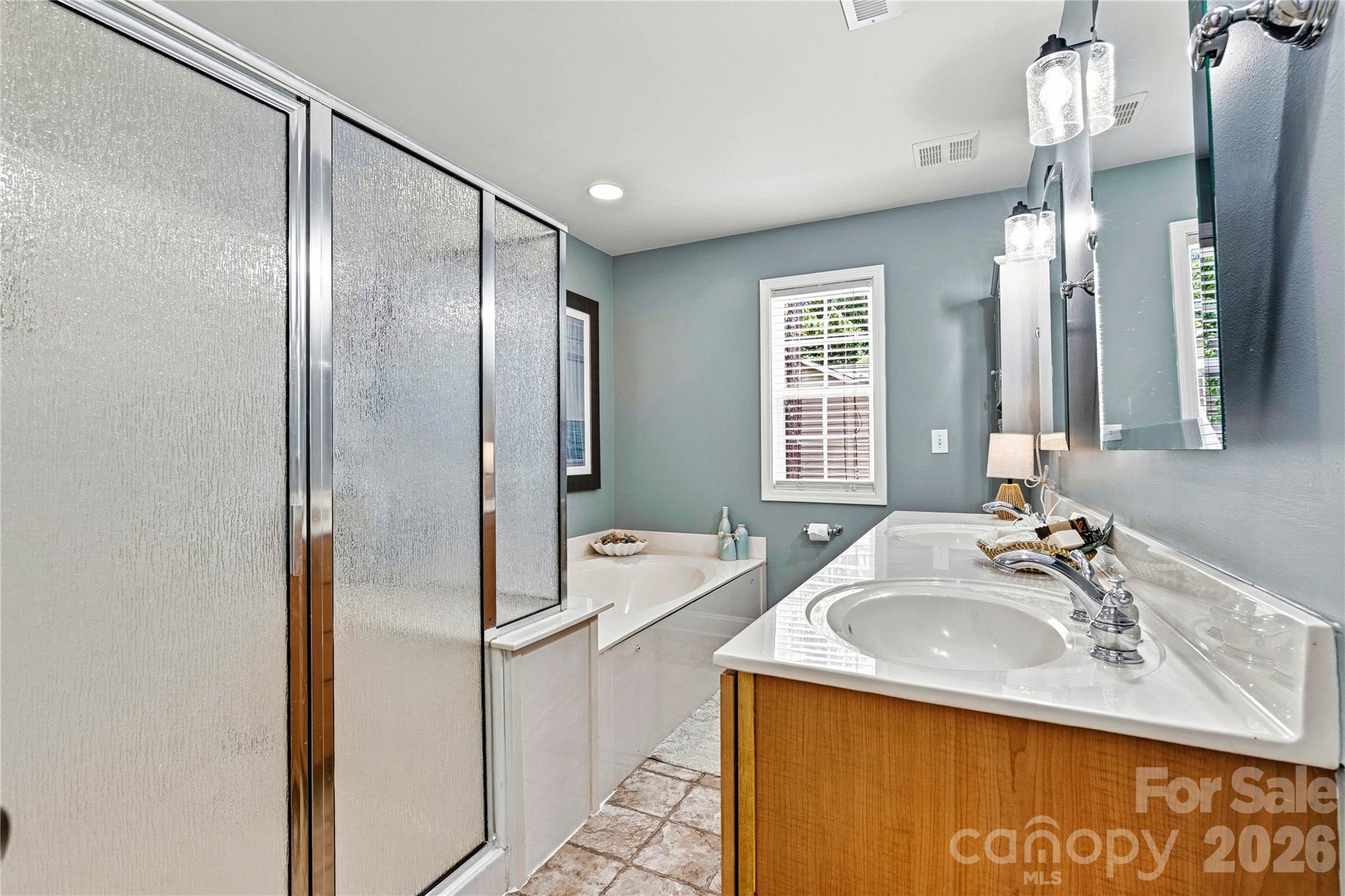 1606 High Ridge Drive Stanley, NC 28164 - Photo 21 of 44 a bathroom with a sink and a mirror