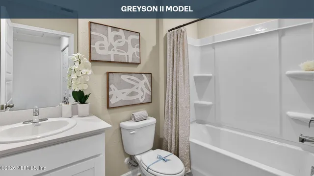 a bathroom with a sink toilet and bathtub