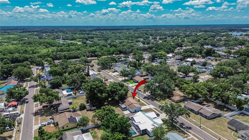 2340 Merrily Circle South Seffner, FL 33584 - Photo 48 of 52 an aerial view of a residential houses with outdoor space