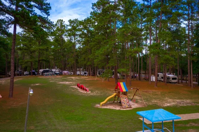 a view of a park with swings