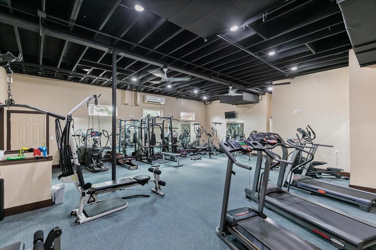 61 Coral Gables Trinity, TX 75862 - Photo 22 of 30 a view of a room with gym equipment