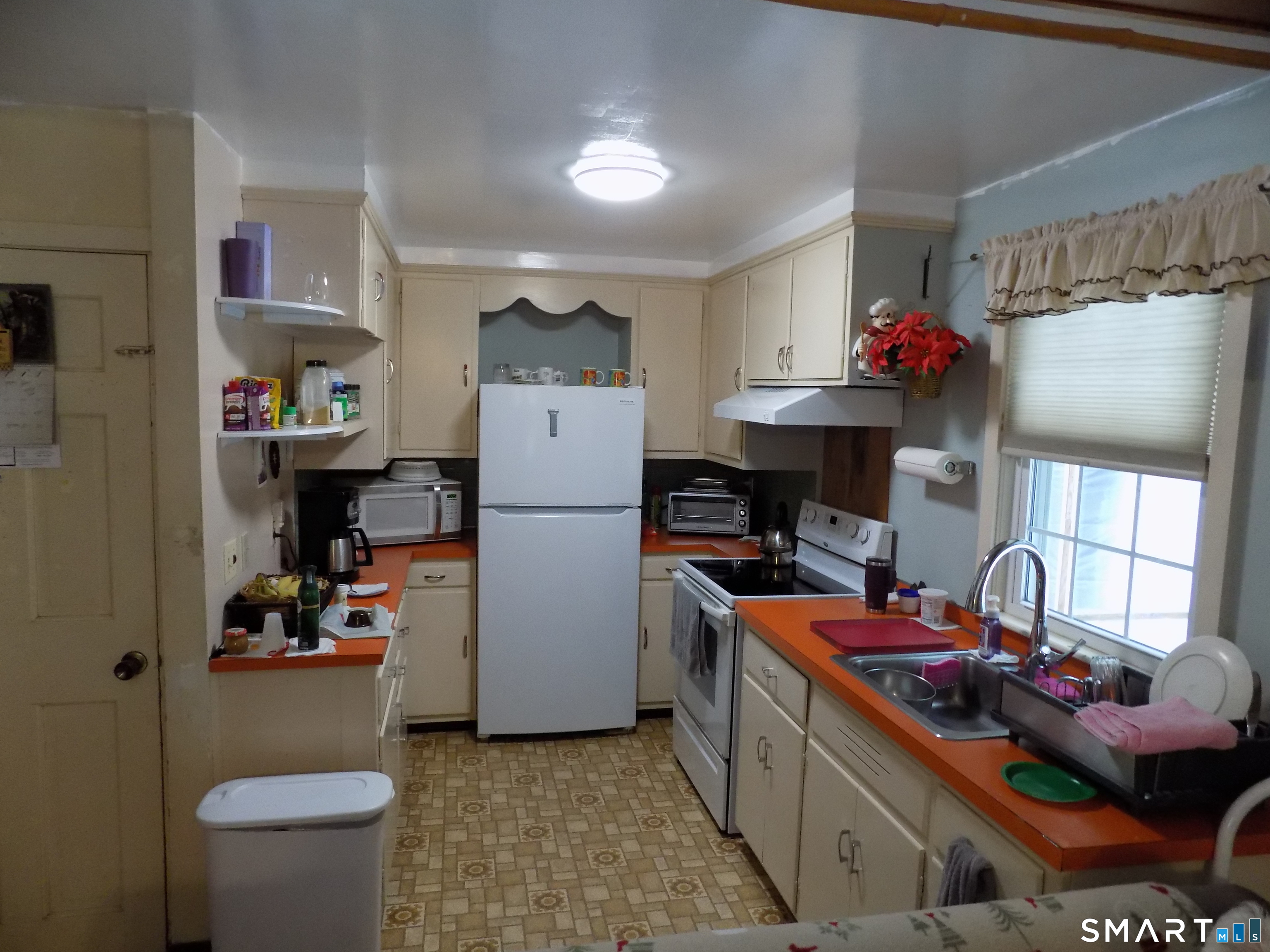309 New Hartford Road Barkhamsted, CT 06063 - Photo 7 of 16 a kitchen that has a lot of fruit and a refrigerator