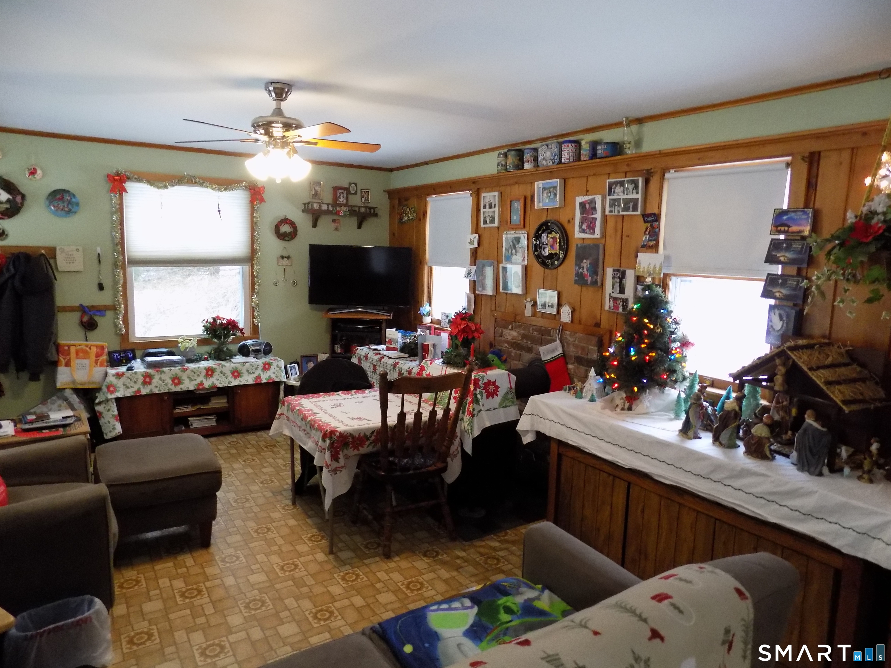 309 New Hartford Road Barkhamsted, CT 06063 - Photo 8 of 16 a living room with furniture and a flat screen tv