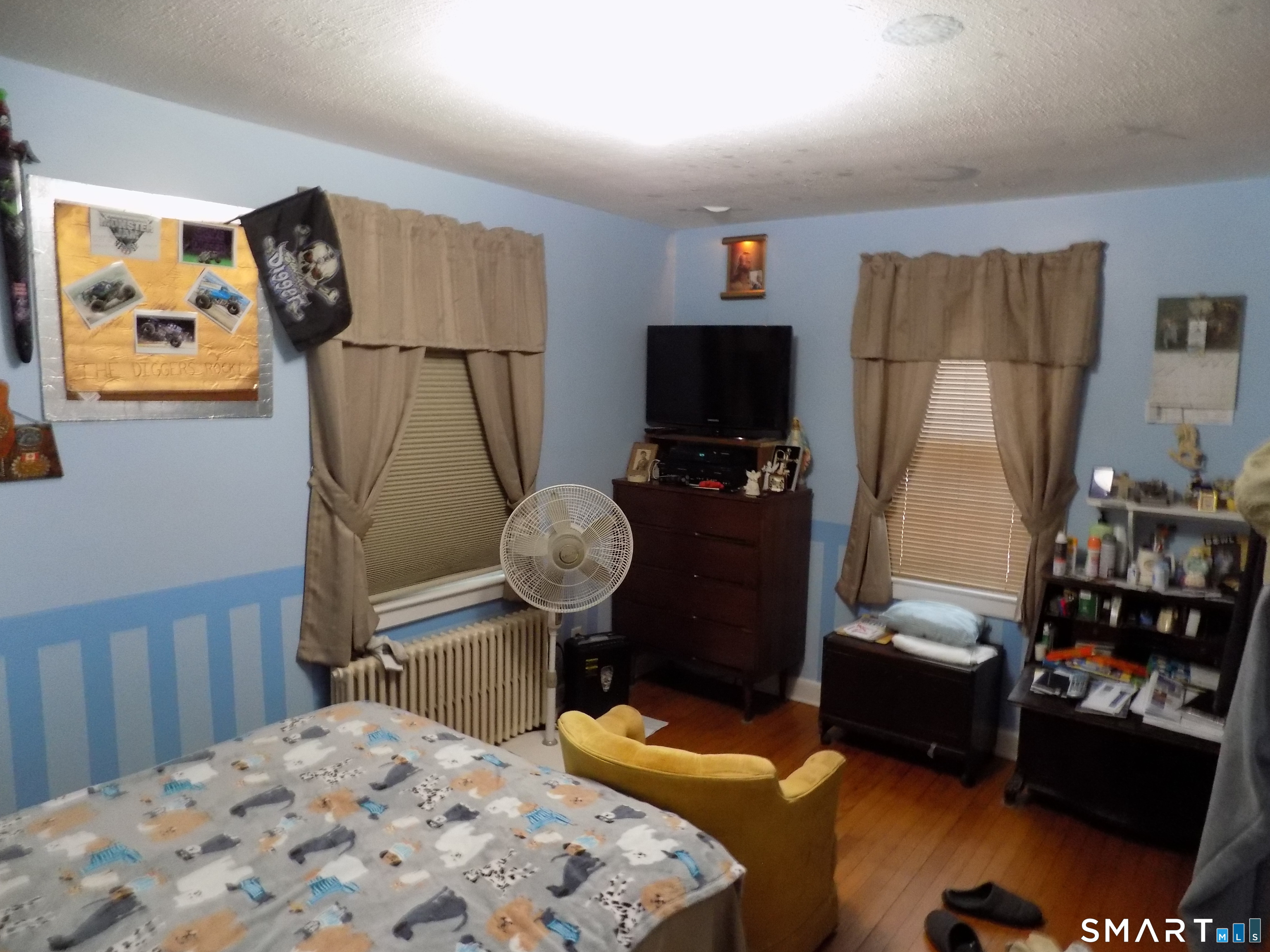 309 New Hartford Road Barkhamsted, CT 06063 - Photo 9 of 16 a bedroom with bed and a flat tv screen