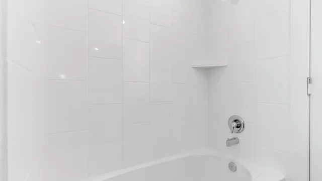 a bathroom with a bathtub