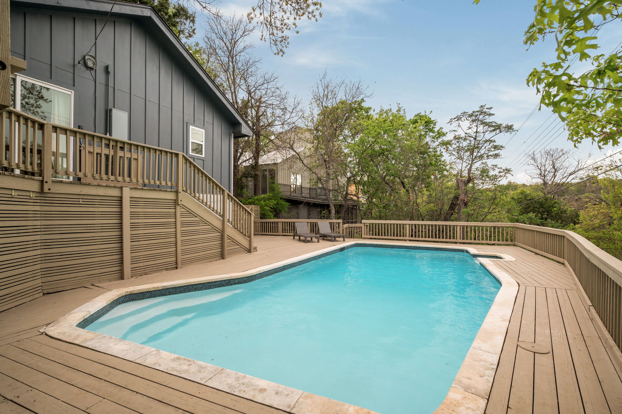 6501 Sumac Drive Austin, TX 78731 - Photo 30 of 40 Outdoor pool featuring a wooden deck and a patio area